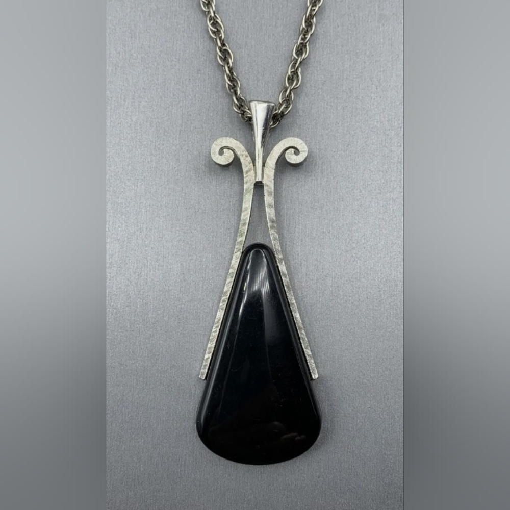 Avon Vintage 1970's Silver and Black Pendant
